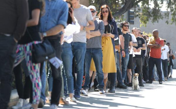 Voters wait in line to cast their ballots at a vote center at a Masonic Lodge in Los Angeles, Calif., on March 3, 2020. (Mario Tama/Getty Images)