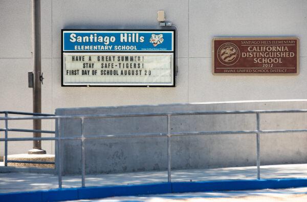 A sign at Santiago Hills Elementary School in Irvine, Calif., announces the first day of school for the 2020–21 school year. (John Fredricks/The Epoch Times)
