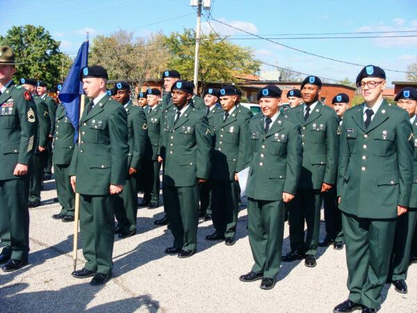 Samuel Johnson holds the flag while standing in formation with fellow soldiers during his Army days. (Courtesy of Samuel Johnson)
