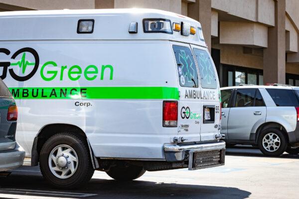 An ambulance is parked outside a DaVita kidney dialysis center in Van Nuys, Calif., on Aug. 31, 2020. (John Fredricks/The Epoch Times)