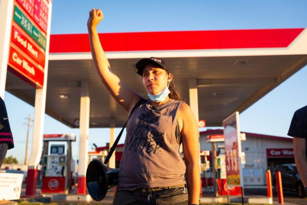 Protest organizer Steph Marie Murphy stands in Yucaipa, Calif., on Aug. 1, 2020. (John Fredricks/The Epoch Times)