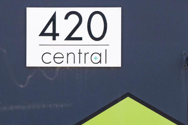 A sign for 420 Central hangs above the entryway to the cannabis shop in Santa Ana, Calif., on Aug. 14, 2020. (John Fredricks/The Epoch Times)