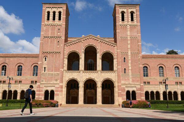 A student walks toward Royce Hall on the campus of the University of California–Los Angeles in Los Angeles, Calif., on March 11, 2020. (Robyn Beck/AFP via Getty Images)