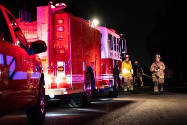 Firefighters on scene to put out an electrical box on fire in Fountain Valley, Calif., on Sept. 4, 2020. (John Fredricks/The Epoch Times)