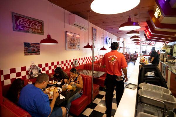 People eat at the Busy Bee Diner in Ventura, Calif., on May 24, 2020. (Brent Stirton/Getty Images)