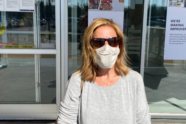 Amy Nguyen stands in Costa Mesa, Calif., on Oct. 29, 2020. (Jack Bradley/The Epoch Times)