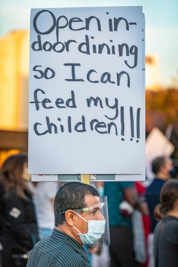 Demonstrators gathered peacefully to march down several blocks of Second Street, in Long Beach, Calif., on Dec. 2, 2020. (John Fredricks/The Epoch Times)