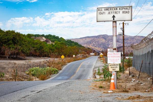 The roadway to the entry of All American Asphalt in Irvine, Calif., on Dec. 9, 2020. (John Fredricks/The Epoch Times)
