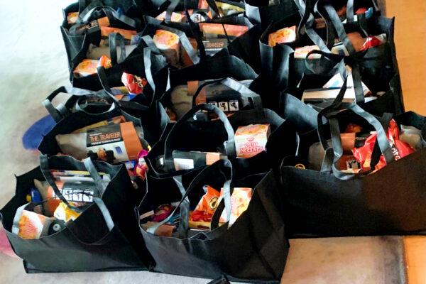 Care packages filled with items for the homeless line the floor of Zoey and Jake Cutter's home in Laguna Beach, Calif. (Courtesy of Zoey and Jake Cutter)