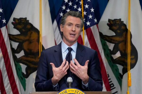 California Gov. Gavin Newsom outlines his 2021-2022 state budget proposal during a news conference in Sacramento, Calif., on Jan. 8, 2021. (Rich Pedroncelli/Pool/AP Photo)
