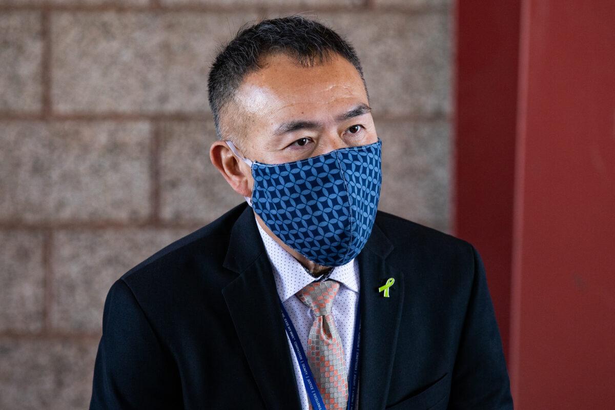 Orange County Health Care Agency Director Dr. Clayton Chau speaks on the opening day of a COVID-19 vaccination site at the Orange County Fairgrounds in Costa Mesa, Calif., on March 31, 2021. (John Fredricks/The Epoch Times)