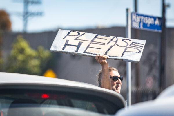 A homeless individual in Venice Beach, Calif., on June 8, 2021. (John Fredricks/The Epoch Times)