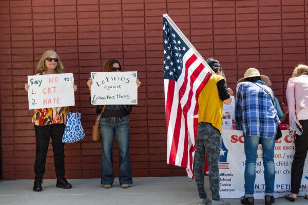 Demonstrators gather in front of Los Alamitos Unified School District Headquarters in protest of critical race theory teachings in Los Alamitos, Calif., on May 11, 2021. (John Fredricks/The Epoch Times)