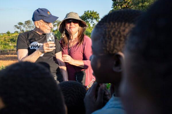 Water Wells for Africa volunteers Paul and Rachel Ilger test the water at a well they donated with their church in Maggie Village B, Malawi, on June 30, 2021. (John Fredricks/The Epoch Times)
