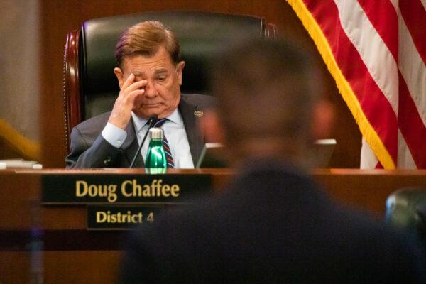 Orange County Board of Supervisor Doug Chaffee listens to Dr. Clayton Chau at a Board of Supervisors meeting in Santa Ana, Calif., on Aug. 10, 2021. (John Fredricks/The Epoch Times)