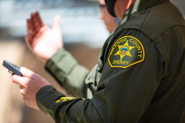 Deputy Doug Martin speaks to reporters at the Orange County Sheriff's Department Law Enforcement Shooting Range in Orange, Calif., on March 30, 2021. (John Fredricks/The Epoch Times)