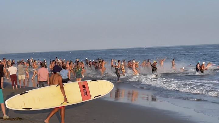 Swimmers race into the Ocean for the Memorial Biathlon on East Beach in Santa Barbara, Calif. (Photo courtesy of Bill Gough)