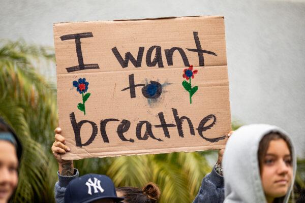 Parents and students gather in protests of wearing masks in schools in front of The Orange County Board of Education in Costa Mesa, Calif., on May 17, 2021. (John Fredricks/The Epoch Times)