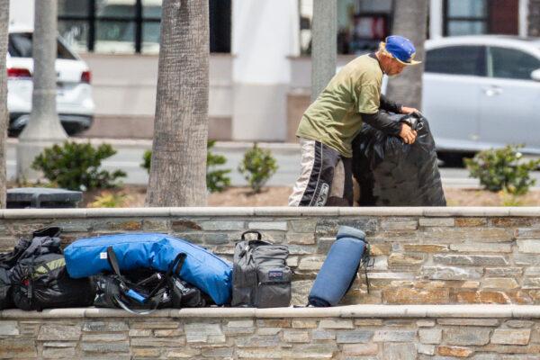 A homeless individual in Huntington Beach, Calif., on May 5, 2021. (John Fredricks/The Epoch Times)