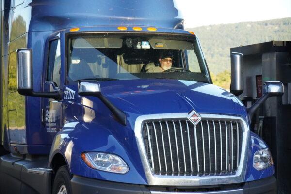A driver backs into a parking spot at the One9 truck stop in Wildwood, Ga., on Oct. 18, 2021. (Jackson Elliott/The Epoch Times)