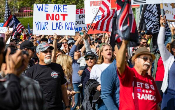City workers and first responders of Los Angeles gather in front of Los Angeles City Hall in protest of the city's required vaccine mandates on Nov. 8, 2021. (John Fredricks/The Epoch Times)