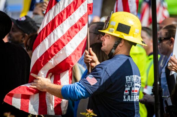 City workers and first responders of Los Angeles gather in front of Los Angeles City Hall in protest of the city's required vaccine mandates on Nov. 8, 2021. (John Fredricks/The Epoch Times)