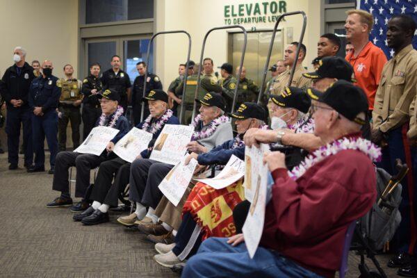 Eight local WWII veterans flew to Oahu, Hawaii, for a Pearl Harbor commemoration at John Wayne Airport in Santa Ana, Calif., on Dec. 4, 2021. (Brandon Drey/The Epoch Times)