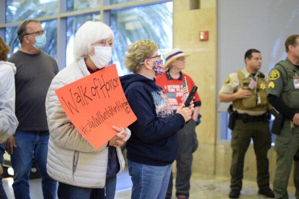 Eight local WWII veterans flew to Oahu, Hawaii, for a Pearl Harbor commemoration at John Wayne Airport in Santa Ana, Calif., on Dec. 4, 2021. (Brandon Drey/The Epoch Times)