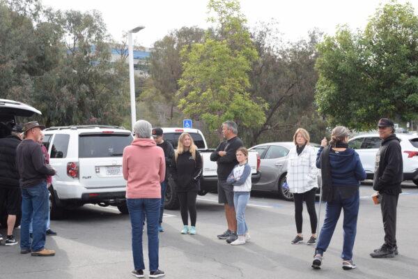 Family and friends of Scott Karsten, 60, who went missing last October, organized a search-and-rescue party in San Clemente, Calif., on Dec. 21, 2021. (Brandon Drey/The Epoch Times)