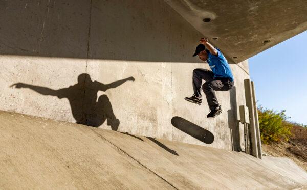 Skateboarder Kwami Adzitso lands a trick in Laguna Niguel, Calif., on Sept. 30, 2020. (John Fredricks/The Epoch Times)
