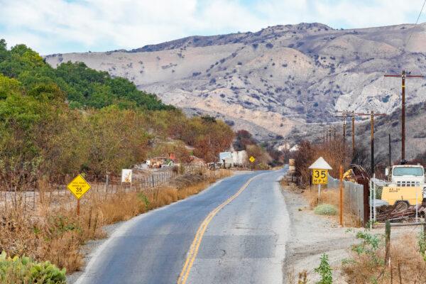 The roadway to the entry of All American Asphalt in Irvine, Calif., on Dec. 9, 2020. (John Fredricks/The Epoch Times)