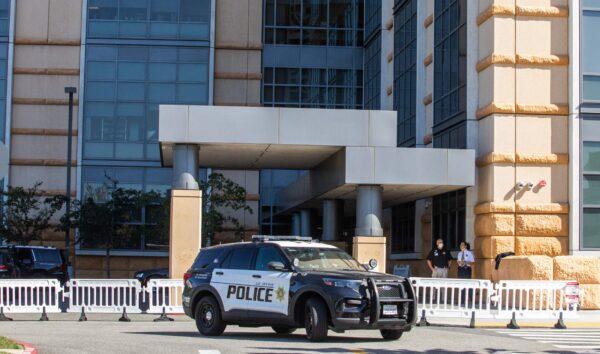 In this file photo, a police car is seen outside the University of California Irvine Medical Center in Orange, Calif., on Oct. 15, 2021. (Apu Gomes/AFP via Getty Images)