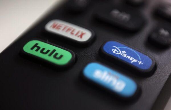 The logos for streaming services Netflix, Hulu, Disney Plus, and Sling TV are pictured on a remote control in Portland, Ore., on Aug. 13, 2020. (Jenny Kane/AP)