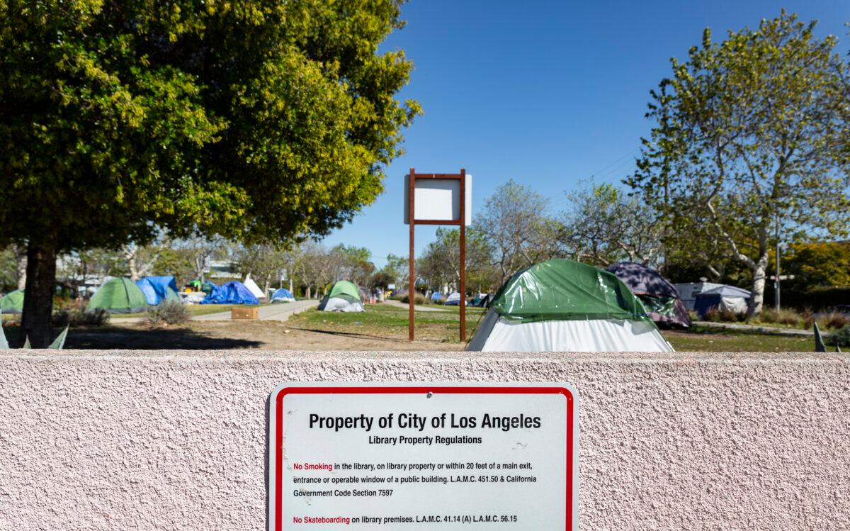 A homeless encampment in front of the Abbot Kinney Memorial Branch Library in Venice, Calif., on Feb. 18, 2022. (John Fredricks/The Epoch Times)