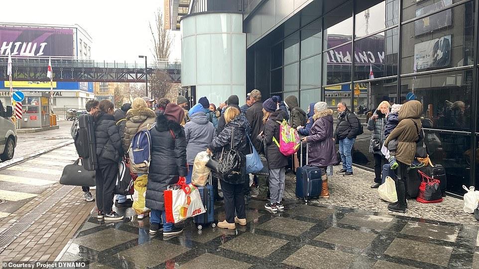 Evacuees wait at their rally point after sheltering during an airstrike in Kyiv, Ukraine. (Courtesy James Judge, Operation Dynamo)