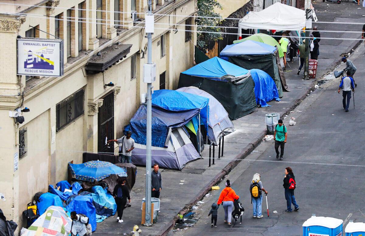 People walk in Skid Row in Los Angeles on Sept. 28, 2019. (Mario Tama/Getty Images)
