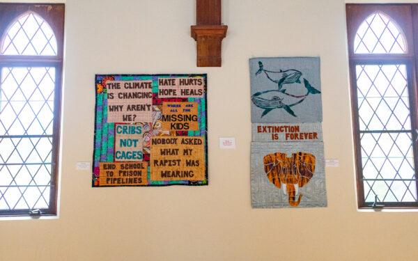 Artist Allyson Allen displays her quilting artwork along the walls of Laguna Friendship Church in Laguna Beach, Calif., on April 1, 2022. (John Fredricks/The Epoch Times)