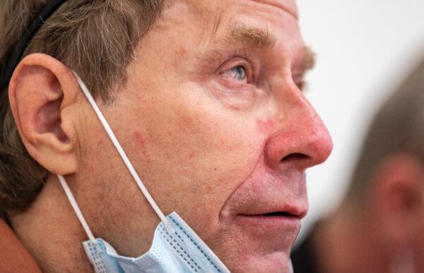Burn victim Michael Zimmer develops tears in his eyes after a display of gratitude for his medical team at UCI Medical Center in Orange, Calif., on April 13, 2022. (John Fredricks/The Epoch Times)