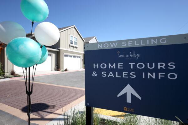 A sign is posted in front of new homes for sale at Hamilton Cottages in Novato, Calif., on Sept. 24, 2020. (Justin Sullivan/Getty Images)