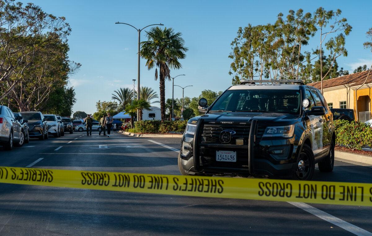 Law enforcement officials respond to a shooting at Geneva Presbyterian Church in Laguna Hills, Calif., on May 15, 2022. (John Fredricks/The Epoch Times)