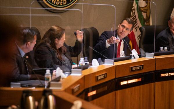 Anaheim Mayor Pro Tem Trevor O’Neil (R) speaks to his colleagues in Anaheim, Calif., on May 24, 2022. (John Fredricks/The Epoch Times)