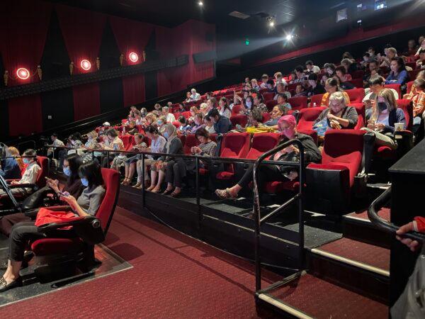 Audience members wait before the start of the Southern California premiere of award-winning documentary "Eternal Spring" at Chinese Theatre in Hollywood, Los Angeles, on June 15, 2022. (Alice Sun/The Epoch Times)