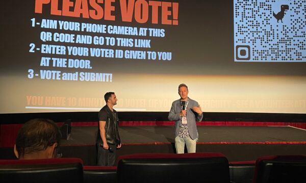 Jason Loftus, director of award-winning documentary "Eternal Spring" answers questions from the audience at the Southern California premiere of the film at Chinese Theatre in Hollywood, Los Angeles, on June 15, 2022. (Alice Sun/The Epoch Times)