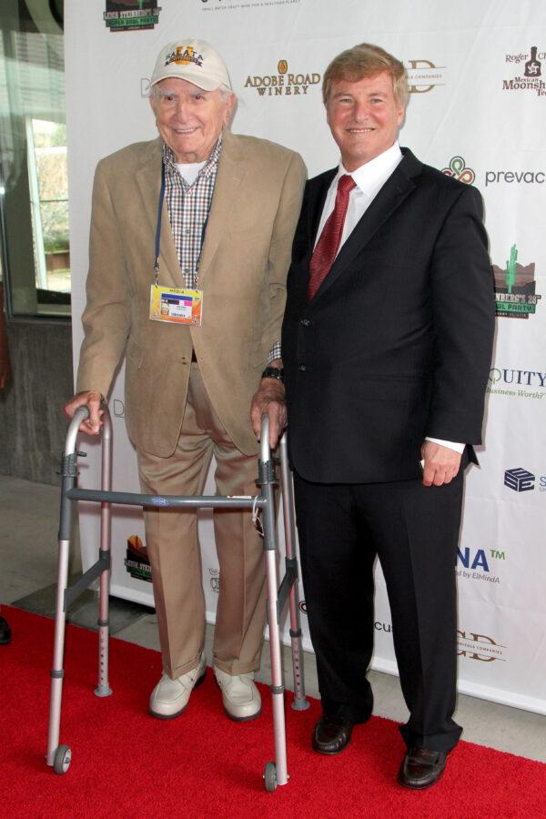 Paul Salata (L) and host Leigh Steinberg attend the 28th Annual Leigh Steinberg Super Bowl Party at Arizona Science Center, in Phoenix, Ariz., on January 31, 2015. (Maury Phillips/Getty Images)