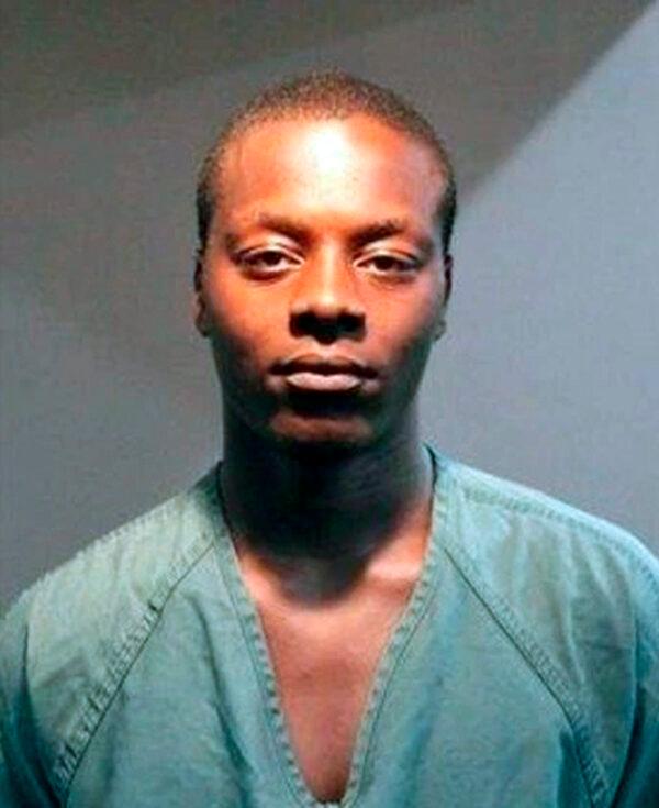 This booking photo released by the Santa Ana Police Department shows suspect Malik Patt, 20, of Los Angeles, on Friday, July 15, 2022. (Santa Ana Police Department via AP)