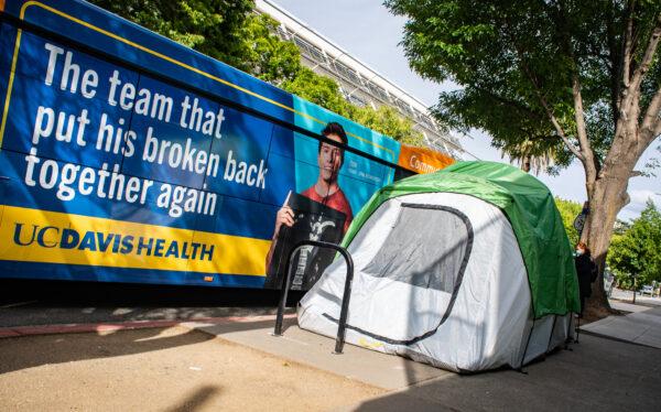 A tent sits on a sidewalk in Sacramento, Calif., on April 18, 2022. (John Fredricks/The Epoch Times)