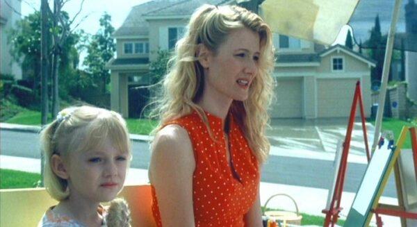 Dakota Fanning as Lucy and Laura Dern as Randy in "I Am Sam." (New Line Cinema)