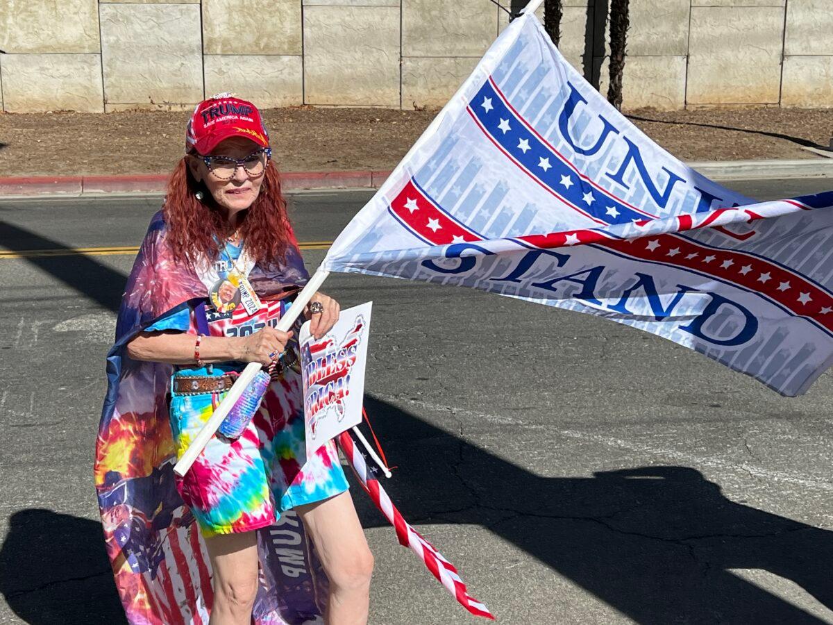 A resident protests in front of an FBI office in Riverside, Calif., on Aug. 10, 2022. (Courtesy of Greg Brittain)