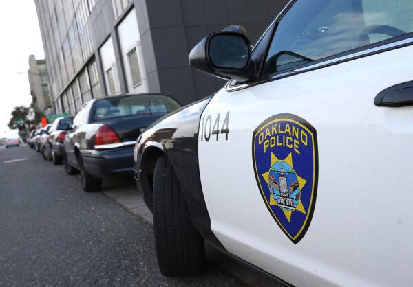 An Oakland Police patrol car sits in front of the police headquarters in Oakland, Calif., on Dec. 6, 2012. (Justin Sullivan/Getty Images)