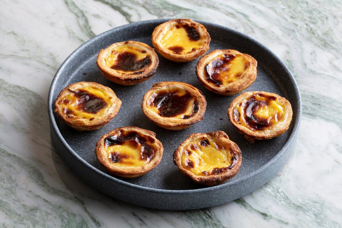Pasteis de nata, with flaky layered crusts and burnished custard centers, are a highlight at Bica. (Melissa Hom)